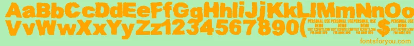 MuddytractordemoKcfonts Font – Orange Fonts on Green Background