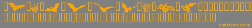 Batbats ffy-Schriftart – Orangefarbene Schriften auf grauem Hintergrund