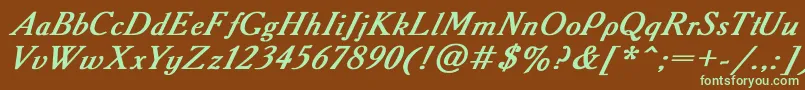 フォントAAdemyItalicBoldItalic – 緑色の文字が茶色の背景にあります。
