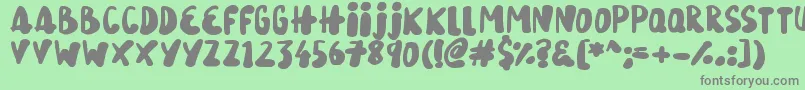 SnowySkies Font – Gray Fonts on Green Background