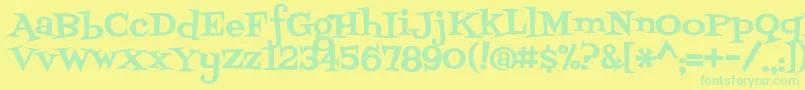 フォントFontdinerswanky – 黄色い背景に緑の文字