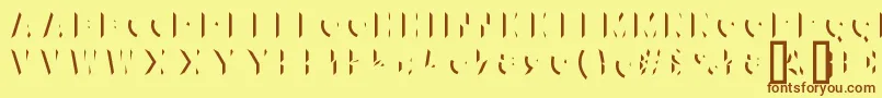 XylitolLeft Font – Brown Fonts on Yellow Background