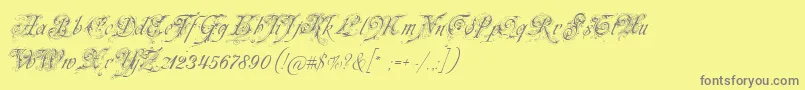 Neuezierschrift-fontti – harmaat kirjasimet keltaisella taustalla