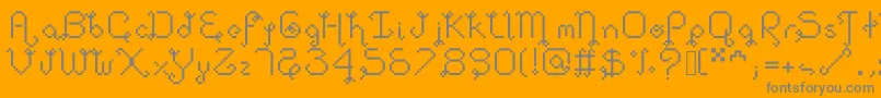 Dollpixellowzz-fontti – harmaat kirjasimet oranssilla taustalla