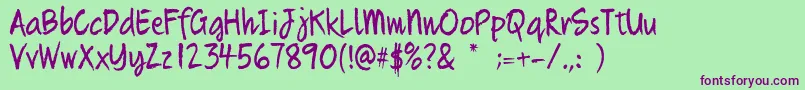 Quikhand Font – Purple Fonts on Green Background