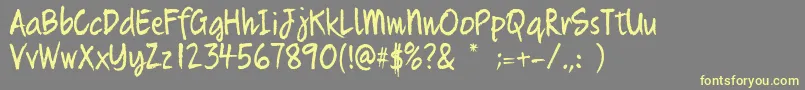Quikhand Font – Yellow Fonts on Gray Background