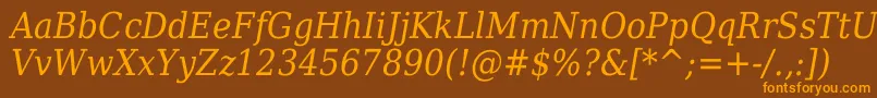 フォントDejavuserifcondensedItalic – オレンジ色の文字が茶色の背景にあります。