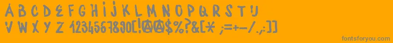 WaterbaseCre-fontti – harmaat kirjasimet oranssilla taustalla