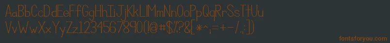 Шрифт Kgcompassion – коричневые шрифты на чёрном фоне