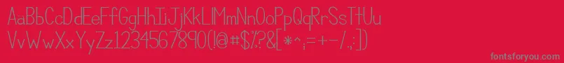 Kgcompassion-Schriftart – Graue Schriften auf rotem Hintergrund