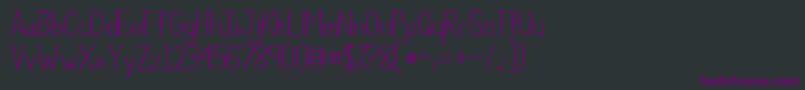 Czcionka Kgcompassion – fioletowe czcionki na czarnym tle
