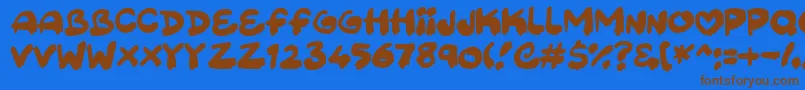 Sweetpaint Font – Brown Fonts on Blue Background