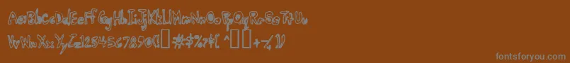 Шрифт Earwax – серые шрифты на коричневом фоне