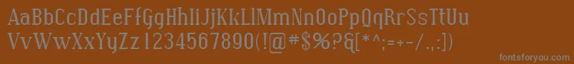 フォントSfcovington – 茶色の背景に灰色の文字