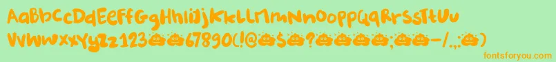 DkBurobu-Schriftart – Orangefarbene Schriften auf grünem Hintergrund