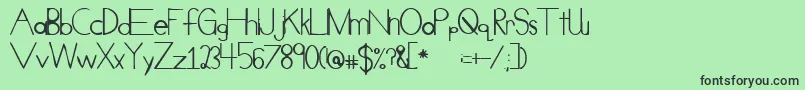 CueueCheesy Font – Black Fonts on Green Background
