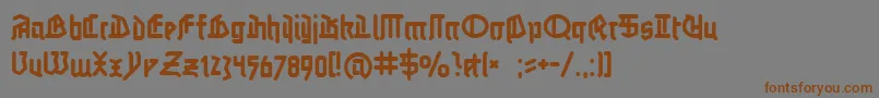 フォントLinotypeauferstehung – 茶色の文字が灰色の背景にあります。