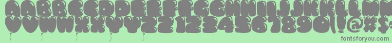More about Bumbazoid Font Bumbazoid Font – Gray Fonts on Green Background