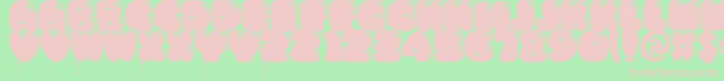 Bumbazoid-fontti – vaaleanpunaiset fontit vihreällä taustalla