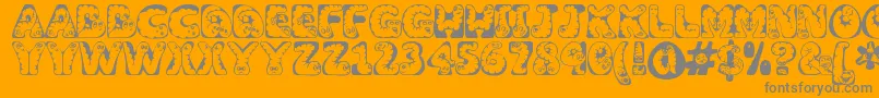 Fonte Wiggles ffy – fontes cinzas em um fundo laranja