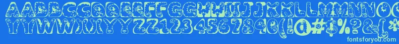 Wiggles ffy Font – Green Fonts on Blue Background