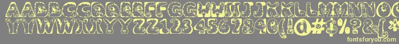 Wiggles ffy Font – Yellow Fonts on Gray Background