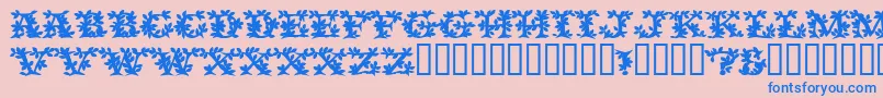 フォントVinecapssskBold – ピンクの背景に青い文字
