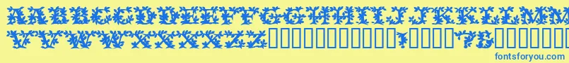 フォントVinecapssskBold – 青い文字が黄色の背景にあります。