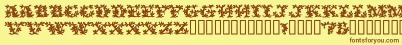 Шрифт VinecapssskBold – коричневые шрифты на жёлтом фоне