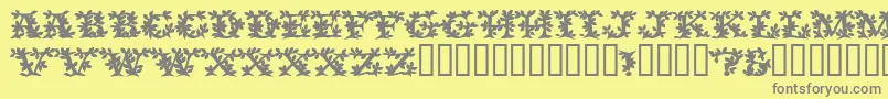 VinecapssskBold-Schriftart – Graue Schriften auf gelbem Hintergrund