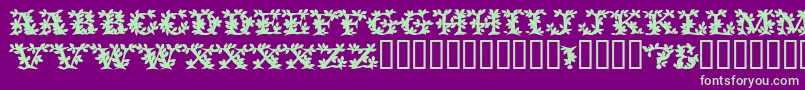 フォントVinecapssskBold – 紫の背景に緑のフォント