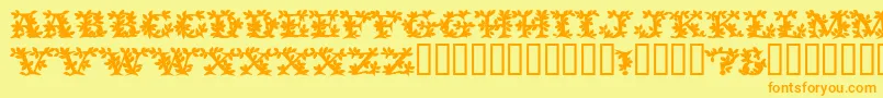 VinecapssskBold-fontti – oranssit fontit keltaisella taustalla