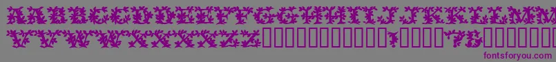 フォントVinecapssskBold – 紫色のフォント、灰色の背景