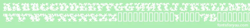 Czcionka VinecapssskBold – białe czcionki na zielonym tle