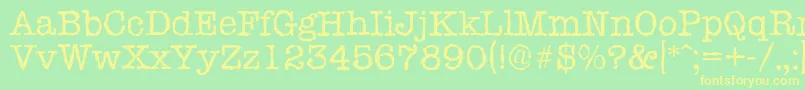 TypewriterrandomRegular-Schriftart – Gelbe Schriften auf grünem Hintergrund