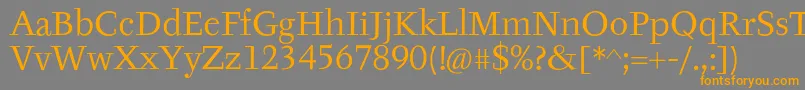 フォントTyfaItcOt – オレンジの文字は灰色の背景にあります。