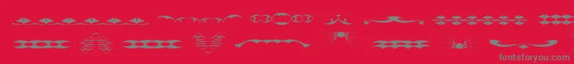 Fonte TribalismFree – fontes cinzas em um fundo vermelho