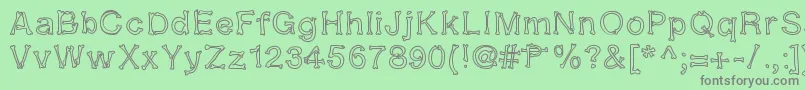 Kalansayetika Font – Gray Fonts on Green Background