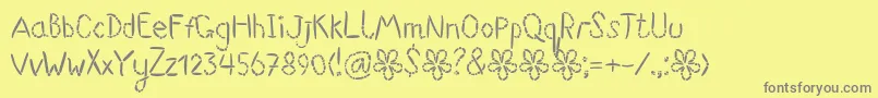 Suwikisu Font – Gray Fonts on Yellow Background