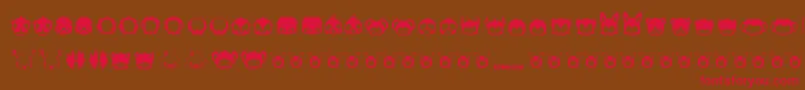 Pictoserie7-Schriftart – Rote Schriften auf braunem Hintergrund