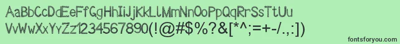 フォントDecorissimantViper78 – 緑の背景に黒い文字