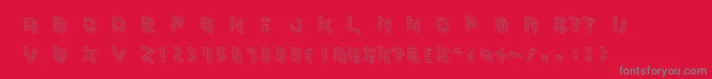 Cubicblock-fontti – harmaat kirjasimet punaisella taustalla