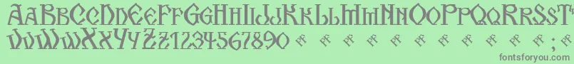 フォントKogaionScFrV39 – 緑の背景に灰色の文字