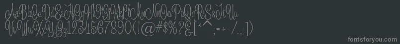 Campanella-fontti – harmaat kirjasimet mustalla taustalla