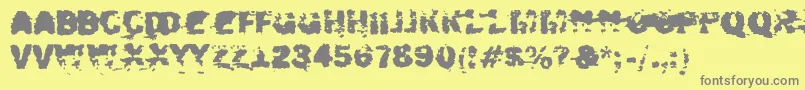 Xposed-fontti – harmaat kirjasimet keltaisella taustalla