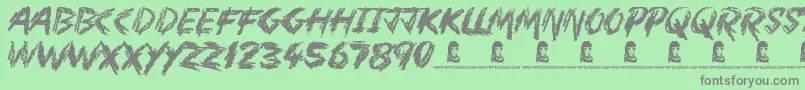 フォントMotherInLaw – 緑の背景に灰色の文字
