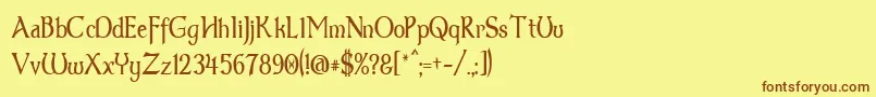 フォントDumbledor3Thin – 茶色の文字が黄色の背景にあります。