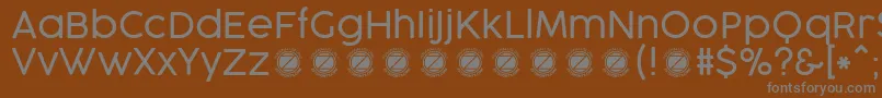 Шрифт CocogooseProLightTrial – серые шрифты на коричневом фоне