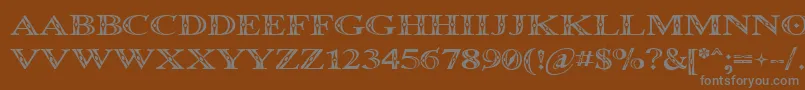 Occoluchi-Schriftart – Graue Schriften auf braunem Hintergrund