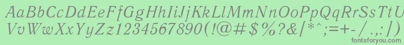 フォントAntiqua1 – 緑の背景に灰色の文字